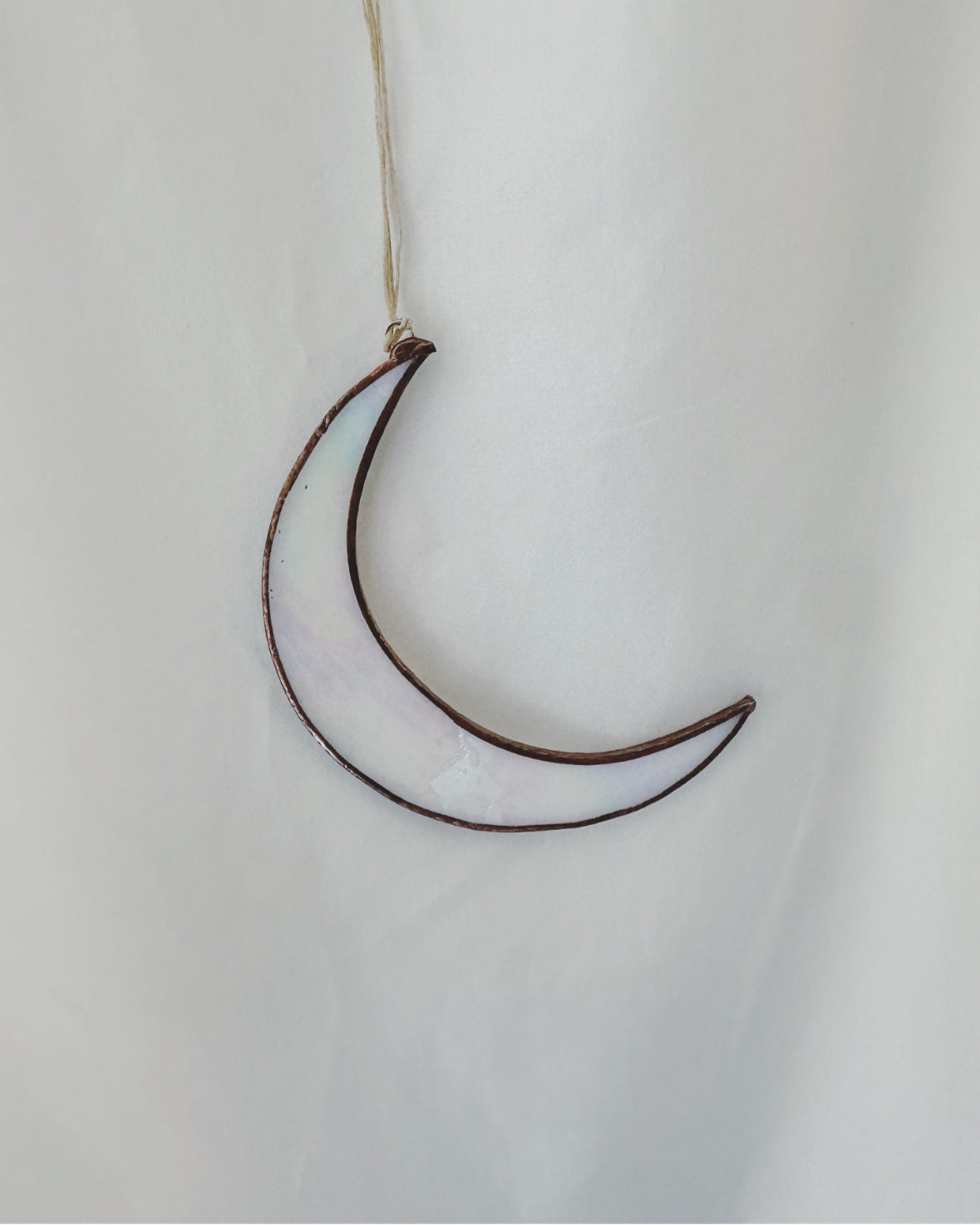 white iridescent crescent moon stained glass ornament
